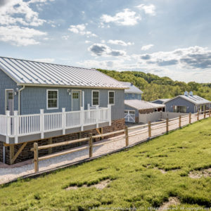 Garage with Vinyl Shake Siding and Metal Roof