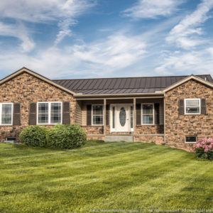 New house with Textured Bronze Standing Seam