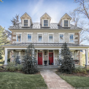 Stone House with Slate Gray Standing Seam