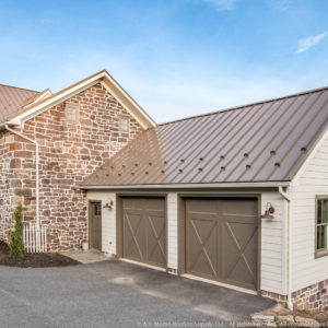 Garage with Medium Bronze ABSeam Roof