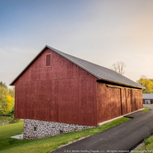 Red Barn with Black ABM Panel Roof