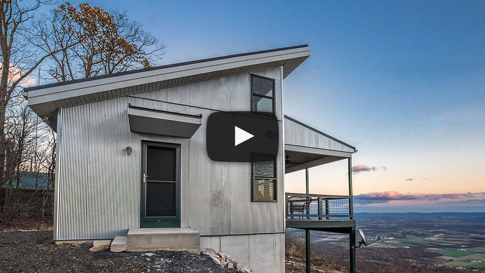 Building Showcase: Mountaintop Cabin with Amazing View and Black Metal Roof