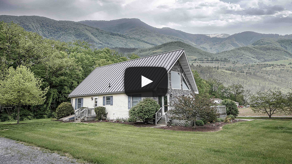 Building Showcase: A-frame House with Textured Metal Roof