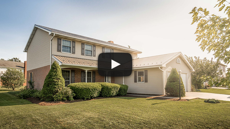 Building Showcase: Bronze ABM Panel Metal House Roof