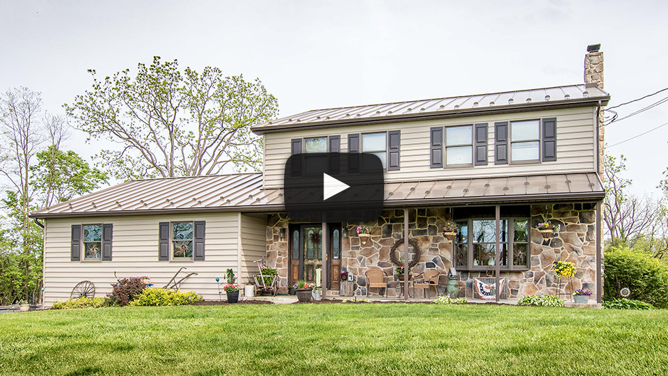 Building Showcase: House with Medium Bronze Standing Seam Roof