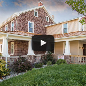 Building Showcase: Farmhouse with Copper Penny Porch Roof