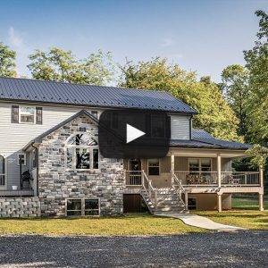 Building Showcase: Amish House with Textured Black Metal Roof