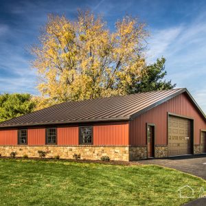 Black Metal Roof on Red Garage