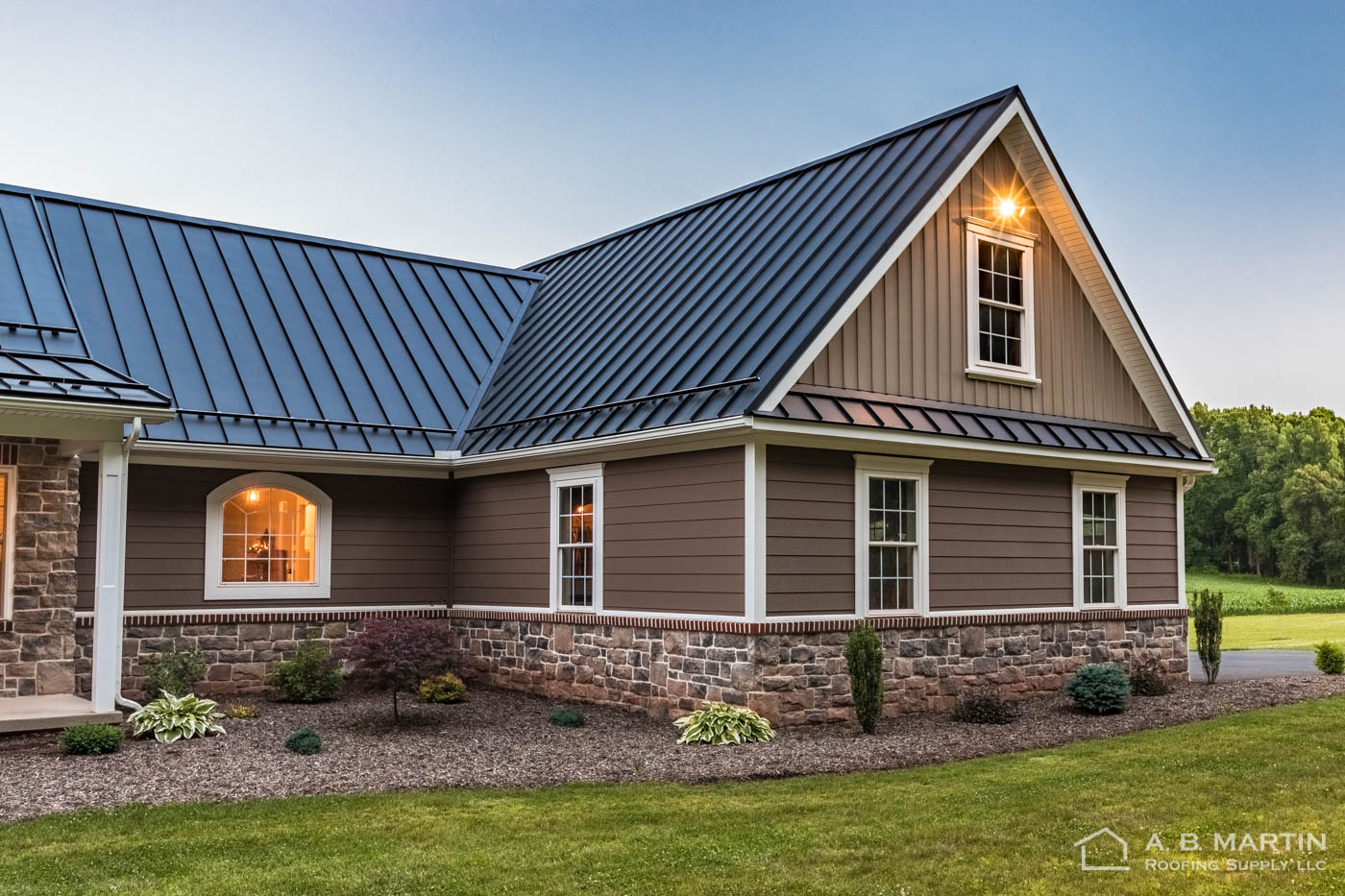 New House with Textured Black ABSeam Roof  A B Martin 